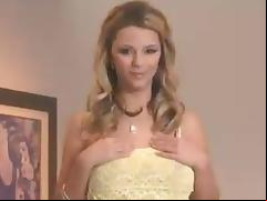 Busty blonde bimbo posing and masturbating