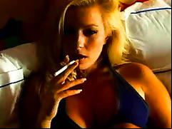 Milf strokes her pink pearl in solo scene
